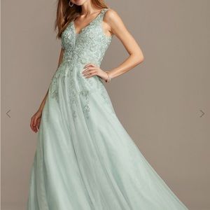 Xscape teal/ light blue prom dress. Size 6. Very negotiable on price. Never worn